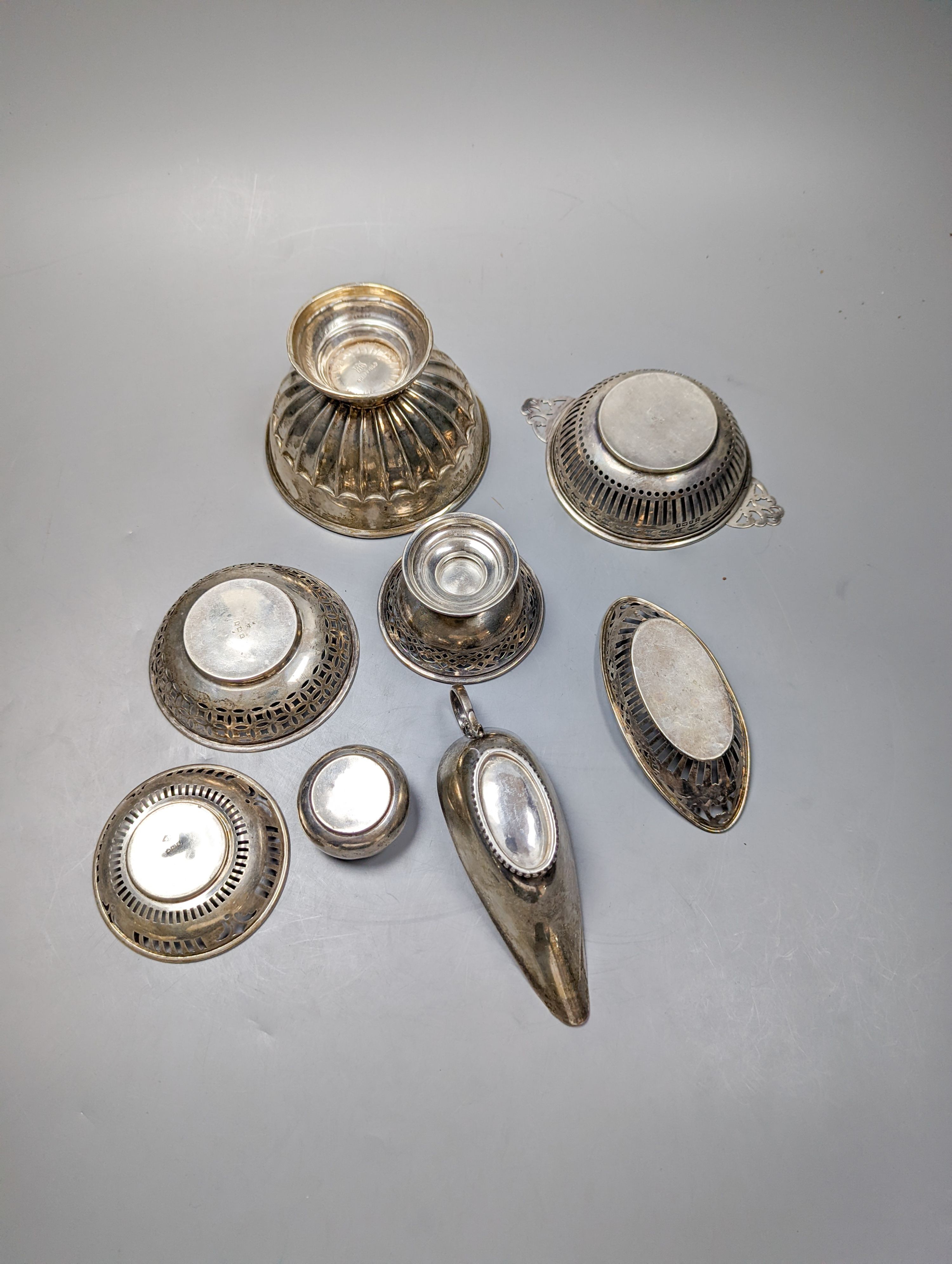 An Edwardian silver bowl, Sheffield, 1904, diameter 11.7cm, five assorted small silver bonbon dishes, a small silver pot and a small silver sauceboat, 12.5oz.